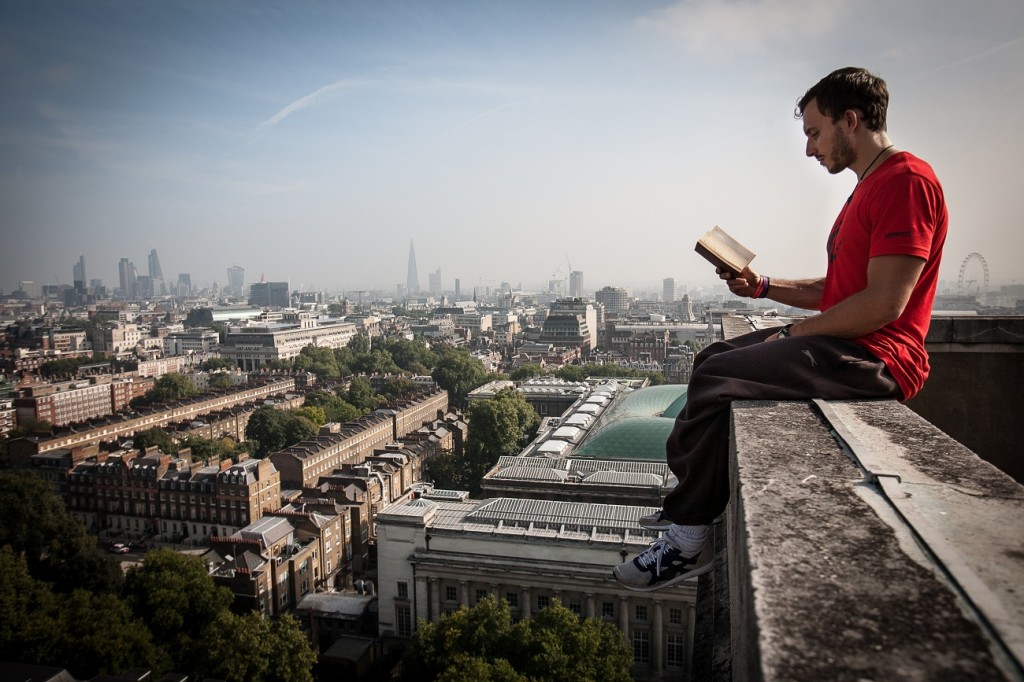 Kevin Francomme reading on the Senate House tower. The British Museum is visible in the background. 
